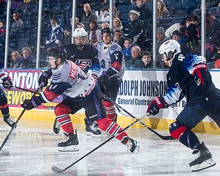 Scott R. Galvin | The Vindicator.Youngstown Phantoms forward Dalton Messina (14) looks for an open player to pass to against Team USA NTDP during the second period at the Covelli Centre on Saturday, February 16, 2019.