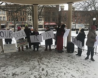 About 20 people assembled on the gazebo and Courthouse Square to protest President Trump‘s declaration of a national emergency to build a border wall. 