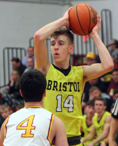 William D. Lewis The Vindicator Bristol's Matt Church and Mooney's Mark Phillips(4).