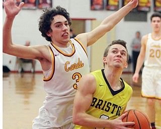 William D Lewis The Vindicaotr  Bristol's Damion Durst(3) drives by Mooney's Sonny Rodriguez(3).