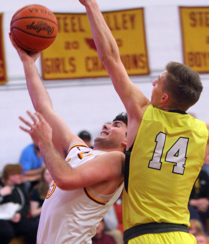 William D. Lewis The vindicator  Mooney's Pete Haas(5)shoots past Bristol's Matt Church(14).