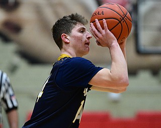 STRUTHERS, OHIO - FEBRUARY 19, 2019: Lowellvile's Matt Hvisdak shoots a three point shot during the first half of their game, Tuesday night at Struthers High School. Lowellville won 55-48. DAVID DERMER I THE VINDICATOR