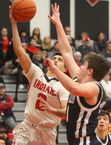 William D. Lewis The Vindictor  Girard's Austin Claussell(2) shoots) shoots over McDonald'sJake Portolese(40)) during 2-20-19 action at Girard.