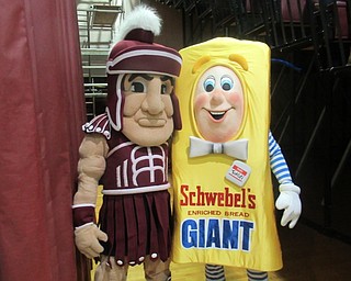 Neighbors | Jessica Harker.Boardman High School Spartan mascot and Toasti, the Schwebel Baking Company mascot, posed together Jan. 25 at the school's annual winter pep rally.