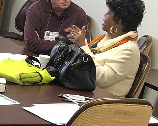 Neighbors | Submitted.United Way volunteers meet with community members offering help with filing taxes for free at multiple locations across the Mahoning Valley through April.