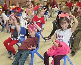 Neighbors | Jessica Harker .Preschool students help pilot the "plane" home from Valentine Land on Feb. 14 at the Austintown Community Church Preschool and Childcare Center.