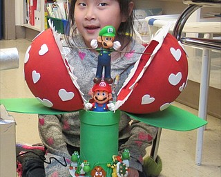 Neighbors | Jessica Harker.Shi Yu DeBow posed with her Mario themed Valentine's box at Poland Union Elementary School's Valentine's Day parties on Feb. 14.
