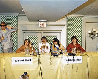 Peter Tork with Monkees singing group at press conference at Warwick Hotel in New York City on July 6, 1967. Left to right: Peter Tork; Davey Jones; Mike Nesmith; Mickey Dolenz. (AP Photo/RH)