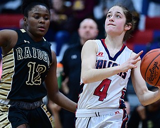 AUSTINTOWN, OHIO - FEBRUARY 21, 2019: Taylor Fronk drives on Harding's Kamarah Bender during the first half of their sectional finals game, Thursday night at Austintown Fitch School. Fitch won 49-33. DAVID DERMER I THE VINDICATOR