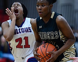 AUSTINTOWN, OHIO - FEBRUARY 21, 2019: Harding's Faith Burch goes to the basket against Fitch's Daria Williams during the second half of their sectional finals game, Thursday night at Austintown Fitch School. Fitch won 49-33. DAVID DERMER I THE VINDICATOR