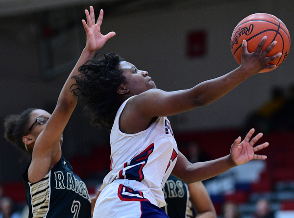 AUSTINTOWN, OHIO - FEBRUARY 21, 2019: Fitch's Jada Lazara goes tot he basket against Harding's Diamond Phillips during the second half of their sectional finals game, Thursday night at Austintown Fitch School. Fitch won 49-33. DAVID DERMER I THE VINDICATOR