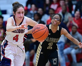 AUSTINTOWN, OHIO - FEBRUARY 21, 2019: Fitch's Taylor Fronk dribbles away from Harding's Diamond Phillips after a take away during the second half of their sectional finals game, Thursday night at Austintown Fitch School. Fitch won 49-33. DAVID DERMER I THE VINDICATOR