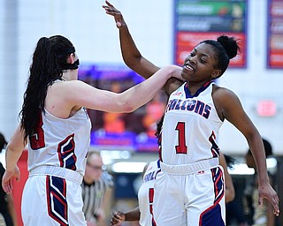 AUSTINTOWN, OHIO - FEBRUARY 21, 2019: Fitch's Mia Jackson, right, celebrates with Sabria Hunter after defeating Harding 49-33 in their sectional finals game, Thursday night at Austintown Fitch School. DAVID DERMER I THE VINDICATOR