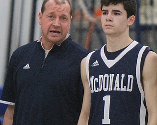 William D. Lewis The Vindicator  McDoanld coach Jeff Rasile and his son Zach during 2-22-19 game at Valley Christian.