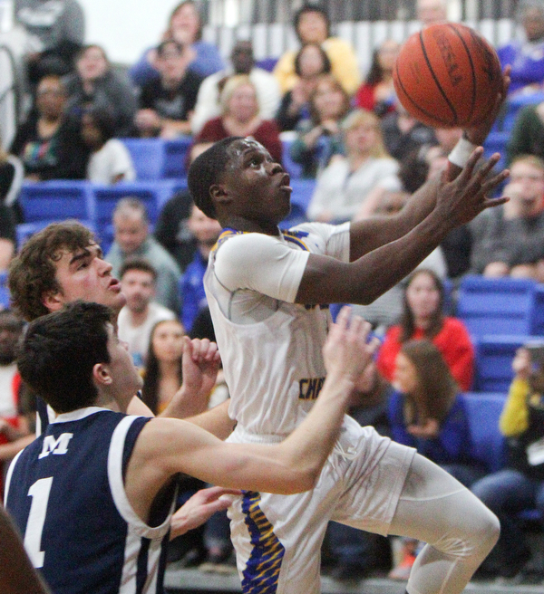 William D. Lewis The Vindicator  Valley's Lohron Brown(1) scores past McDonald's Zach Rasile(1)during 2-22-19 actionat Valley.