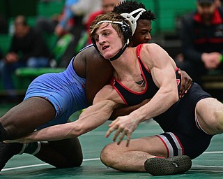 BELOIT, OHIO - FEBRUARY 23, 2019: Canfield's Seth Hull goes for the leg of Alliance's Zach Rodgers during their 152lbs. Sectional Final Championship Bout, Saturday night at West Branch High School. DAVID DERMER | THE VINDICATOR