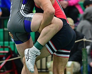 BELOIT, OHIO - FEBRUARY 23, 2019: Canfield's Ben Cutrer controls Poland's Justice Smith during their 170lbs. Sectional Final Championship Bout, Saturday night at West Branch High School. DAVID DERMER | THE VINDICATOR