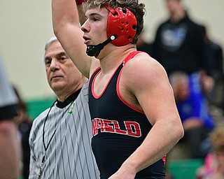 BELOIT, OHIO - FEBRUARY 23, 2019: anfield's Nick Crawford has his arm raised by the referee after pinning West Branch's Kenny Marra during their 195lbs. Sectional Final Championship Bout, Saturday night at West Branch High School. DAVID DERMER | THE VINDICATOR