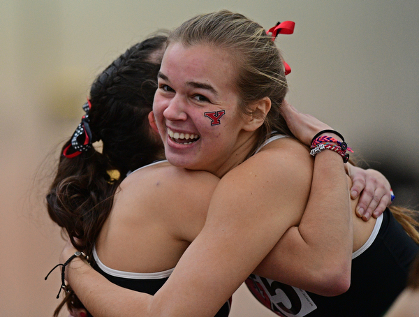 YOUNGSTOWN, OHIO - FEBRUARY 24, 2019: Youngstown State's Natalie Fleming, right, celebrates with Nicole Squatrito after wining the women's 800 meter dash final, Sunday afternoon at the Watt and Tressel Training Facility during the Horizon League Indoor Track Championship. DAVID DERMER | THE VINDICATOR