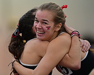 YOUNGSTOWN, OHIO - FEBRUARY 24, 2019: Youngstown State's Natalie Fleming, right, celebrates with Nicole Squatrito after wining the women's 800 meter dash final, Sunday afternoon at the Watt and Tressel Training Facility during the Horizon League Indoor Track Championship. DAVID DERMER | THE VINDICATOR