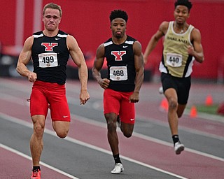 YOUNGSTOWN, OHIO - FEBRUARY 24, 2019: Youngstown State's Chad Zallow sprints ahead of Jamynk Jackson and Oakland's Marcus Nellum during the men's 200 meter dash final, Sunday afternoon at the Watt and Tressel Training Facility during the Horizon League Indoor Track Championship. DAVID DERMER | THE VINDICATOR