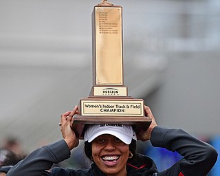 YOUNGSTOWN, OHIO - FEBRUARY 24, 2019: Youngstown State's Chontel Fils celebrates with a championship trophy after Youngstown State won the women's indoor championship, Sunday afternoon at the Watt and Tressel Training Facility during the Horizon League Indoor Track Championship. DAVID DERMER | THE VINDICATOR