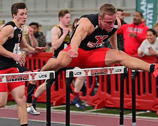 YOUNGSTOWN, OHIO - FEBRUARY 24, 2019: Youngstown State's Chad Zallow clears a hurl during the men's 60 meter hurdles final, Sunday afternoon at the Watt and Tressel Training Facility during the Horizon League Indoor Track Championship. DAVID DERMER | THE VINDICATOR