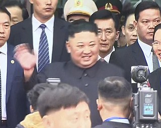 In this image from video, North Korean leader Kim Jong Un waves upon arrival in Dong Dang in Vietnamese border town Tuesday, Feb. 26, 2019, ahead of the second summit with U.S. President Donald Trump.