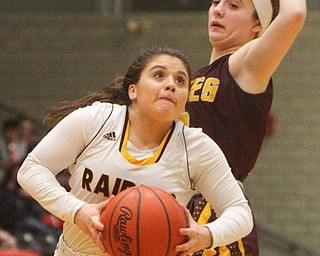 William D. Lewis The VindicatorSouth Range's Bri Modic(11) drives around South East's Emma Keto(12) during 2-27-19 action at Struthers.