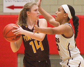 William D. Lewis The Vindicator South Range's Lexi Giles(22) defends against  South East's Shelby Morehead(14) during 2-27-19 action at Struthers.