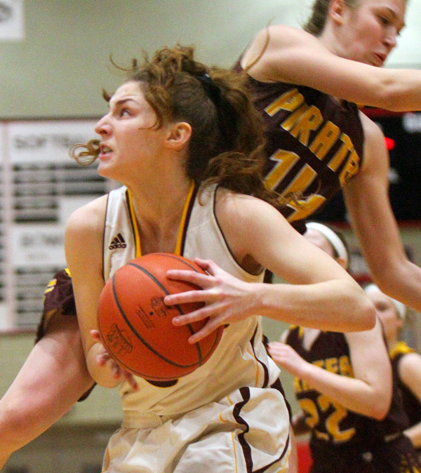 William D. Lewis The VindicatorSouth Range'sIzzy Lampafty(3) collides with ) drives around South East's Olivia Neer(11) during 2-27-19 action at Struthers.
