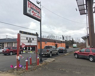 The sign in front of the Hideaway Lounge on Youngstown Road in Niles, where a city woman was shot to death early Sunday. 
