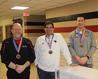 Neighbors | Abby Slanker.The Committee to Support Canfield Schools hosted its third annual Cardinal Chili Cook-off on Feb. 8. Winners included, from left, Rich Keehner of Cocca’s Pizza, hot and spicy category, Alex Geordan, thick and hearty category and Judd Rubin, unconventional category with his chocolate chili-flavored ice cream.