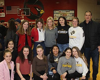 Neighbors | Abby Slanker.Canfield High School girls varsity soccer coach Phil Simone (back, right) joined members of the Canfield HIgh School girls soccer team in congratulating senior Ashley Story (third from right) for signing her letter of intent to continue her academic and soccer career Ohio Dominican on Feb. 8.