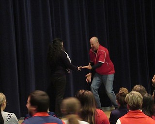 Neighbors | Jessica Harker.Art teacher Mirjana Jelic and Band Director Wes O'Connor faced off as the last two standing in the rock, paper, scissors battle that all teachers gathered at Stanley Leone's lecture at Austintown Fitch High School competed on Feb. 14.