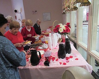 Neighbors | Jessica Harker.Beeghly Oaks residents and community members enjoyed the hot chocolate bar provided at the Cupid's Corner Valentines Day event Feb. 20.