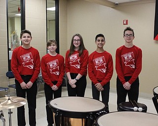 Neighbors | Abby Slanker.Members of the percussion section of the Canfield Village Middle School eighth-grade band, from left, Tim Styranec, Aidan VanDussen, Maddie McCartney, Dev Sethi and Jakob Bowman, prepared to perform at the Canfield Band Parents annual Pasta Dinner on Feb. 23.