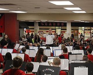 Neighbors | Abby Slanker.With a large crowd watching and listening, the Canfield Village Middle School eighth-grade band, under the direction of James Volenik, performed at the Canfield Band Parents annual Pasta Dinner on Feb. 23.