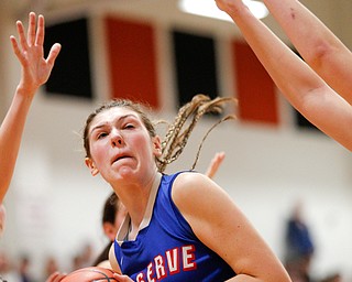 Western Reserve's Danni Vuletich prepares to shoot during their game against McDonald at Mineral Ridge High School on Saturday afternoon. EMILY MATTHEWS | THE VINDICATOR