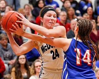 McDonald's Brooke Lewis tries to pass the ball while Western Reserve's Kennedy Miller tries to block her during their game at Mineral Ridge High School on Saturday afternoon. EMILY MATTHEWS | THE VINDICATOR