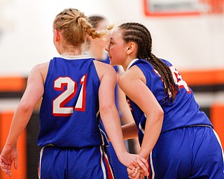 Western Reserve's Olivia Pater, left, and Kennedy Miller talk during their game against McDonald at Mineral Ridge High School on Saturday afternoon. EMILY MATTHEWS | THE VINDICATOR