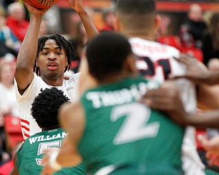 YSU's Jelani Simmons tries to pass the ball during their game against CSU on Saturday night. EMILY MATTHEWS | THE VINDICATOR