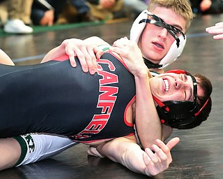 ALLIANCE, OHIO - March 2, 2019: WRESTLING OHSAA D2 Alliance District at Alliance High School-  106 lbs: 1st period, Canfield's Nick Barber tangles with Lake Catholics' Brendan McCronne. Nick Barber won 5-4.  MICHAEL G. TAYLOR| THE VINDICATOR