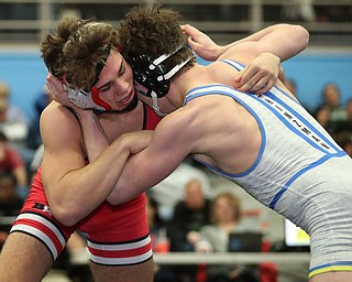 ALLIANCE, OHIO - March 2, 2019: WRESTLING OHSAA D2 Alliance District at Alliance High School-  182 lbs: 2nd period, Canfield's Anthony D'Alesio goes for a move against with Coventry's Austin Hinzman.  Anthony D'Alesio won the championship by a pin.  MICHAEL G. TAYLOR| THE VINDICATOR