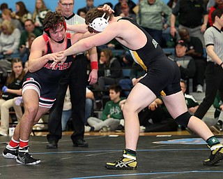 ALLIANCE, OHIO - March 2, 2019: WRESTLING OHSAA D2 Alliance District at Alliance High School-  195 lbs: 1st period, Canfield's Nick Crawford goes for a move against Aurora's Colin Mcnamara.   Nick Crawford won the championship 3-2.  MICHAEL G. TAYLOR| THE VINDICATOR