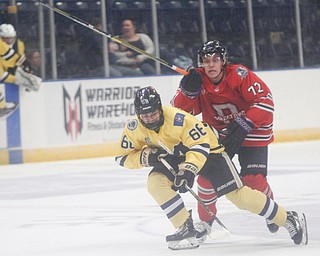 Phantoms' Liam Dennison chases Lumberjacks' Danil Gushchin during their game in the Covelli Centre on Sunday night. EMILY MATTHEWS | THE VINDICATOR