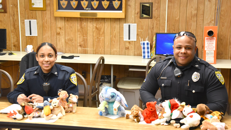 JOE GORMAN | THE VINDICATOR
Youngstown police officers Jennifer Hudson, left, and Ryan Curry show some of the stuffed animals officers use to soothe a young child who is exposed to a crime or violence. Of the city’s three homicides this year, officers found young children at two of them.