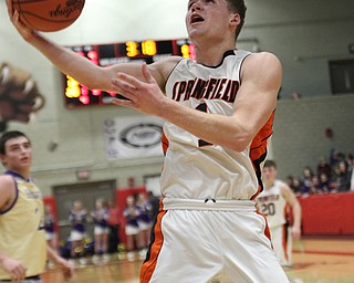 Springfield Evan Ohlin (1) puts up a layup during Monday nights district matchup againsyt Sebring at Struthers High School. Dustin Livesay  |  The Vindicator  3/4/19  Struthers.