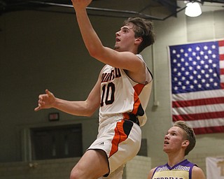 Clay Medvec (10) of Springfield goes up for a layup past the defense of Joey Clack (3) of Sebring during the first half of Monday nights district matchup at Struthers High School. Dustin Livesay  |  The Vindicator  3/4/19  Struthers.