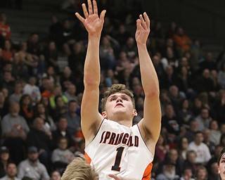 Evan Ohlin (1) of Springfield puts up a shot over Sebrings Joey Clark (3) during Monday nights district matchup at Struthers High School. Dustin Livesay  |  The Vindicator  3/4/19  Struthers.